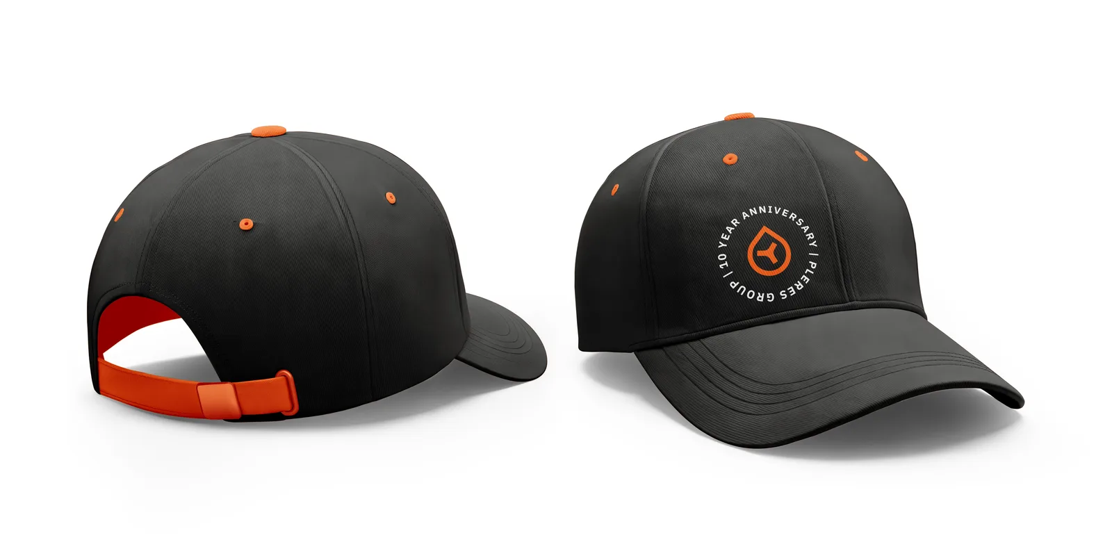 Front and back views of a black cap with orange eyelets and strap, the front embroidered with a circular badge reading 10 Year Anniversary, Pleres Group, around the orange brand mark