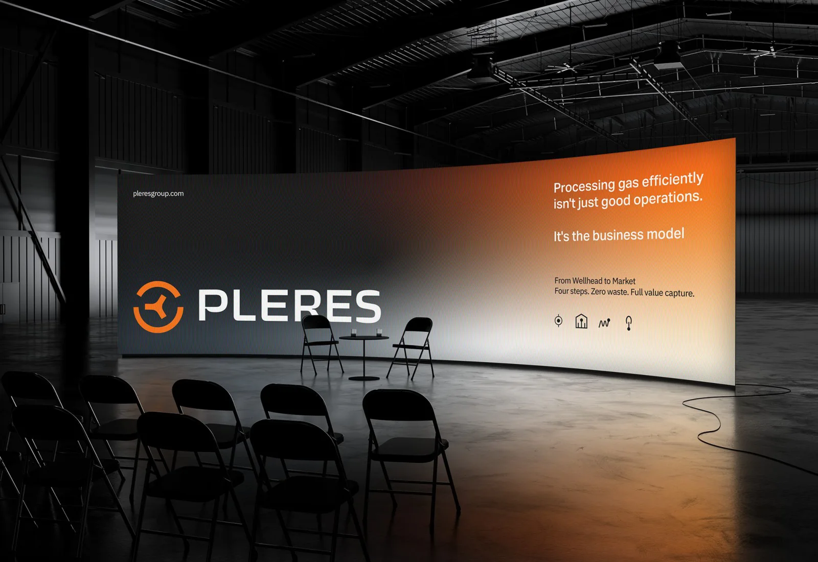 Curved conference stage backdrop on the orange-to-black texture reading Processing gas efficiently is not just good operations. It is the business model. From Wellhead to Market. Four steps. Zero waste. Full value capture, with four process icons beneath, and rows of folding chairs in front