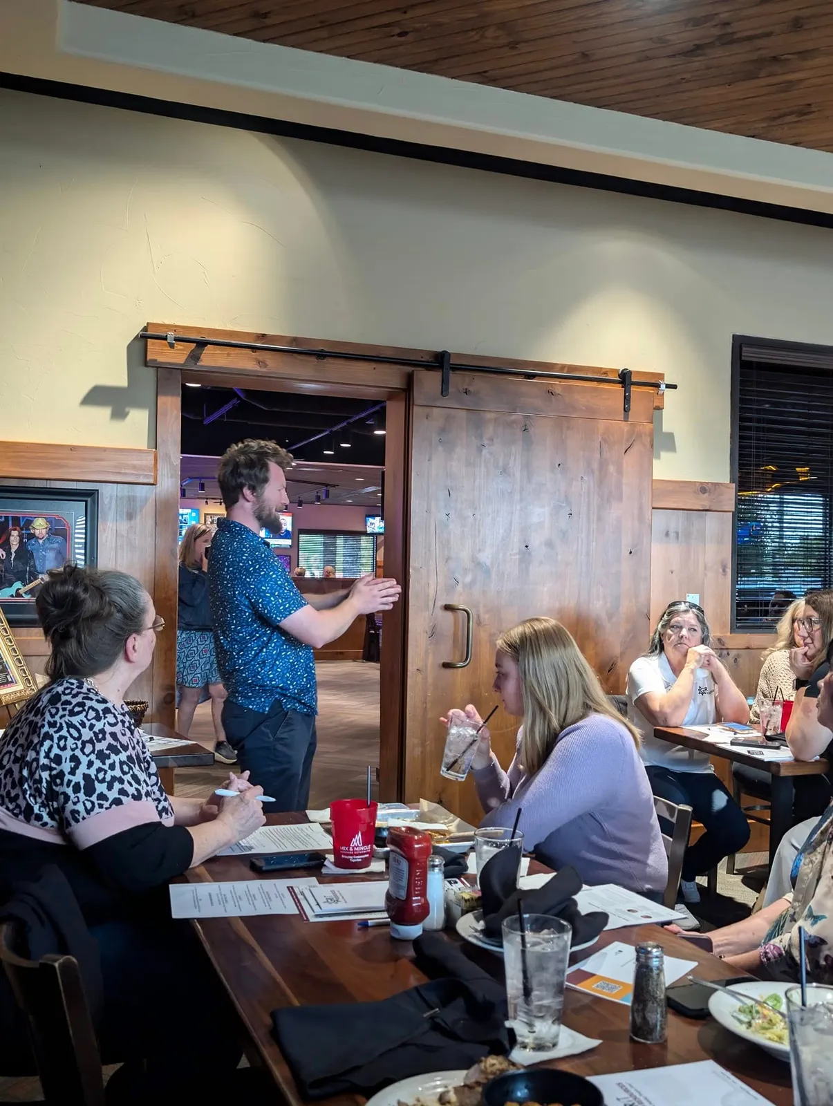 Garrett Hammonds speaking at a local business lunch.