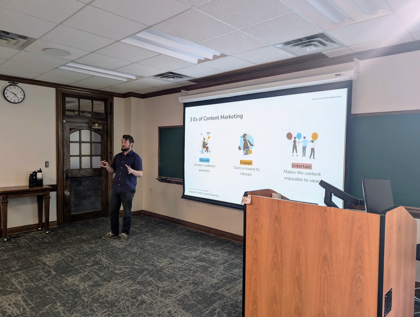 Garrett Hammonds presenting to a University of Oklahoma business class in 2025.